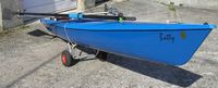 Nice pair of carbon sculls and Turbo Trolley included.